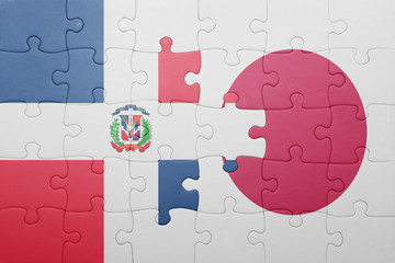 puzzle with the national flag of dominican republic and japan