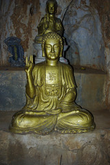 A statue of the Golden Seated Buddha, Marble Mountains, Danang