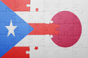 puzzle with the national flag of puerto rico and japan