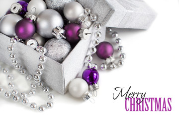 Silver and purple Christmas ornaments border