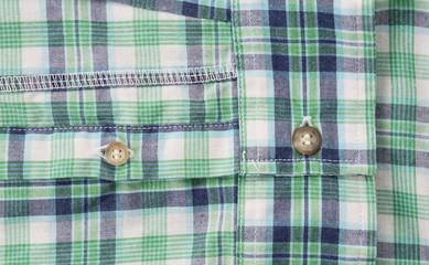 Close up button on scott shirt