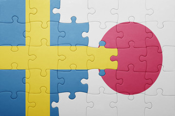 puzzle with the national flag of sweden and japan