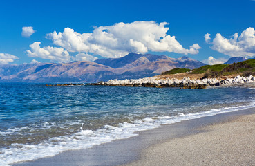 coast of island of Corfu with white rock.