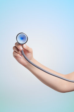 Nurse Hand Holding Stethoscope