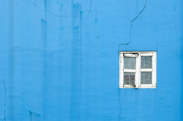 blue crack and broken stucco wall texture with vintage broken white window background
