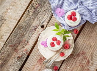 Natural yogurt with fresh raspberries