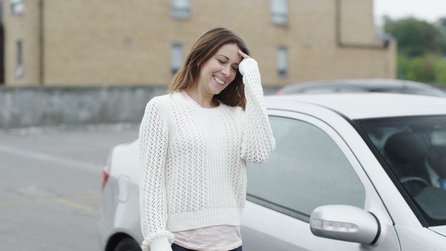  portrait of happy woman with keys to her new car