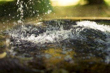 blurred shot of  water splash in a fountain