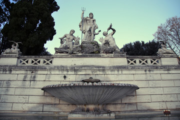 Fototapeta na wymiar Fountain of Neptune in Piazza del Popolo, Rome, Italy ( photogra