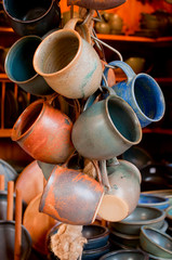 Bunch of ceramic mugs in a street market in Marburg, Germany