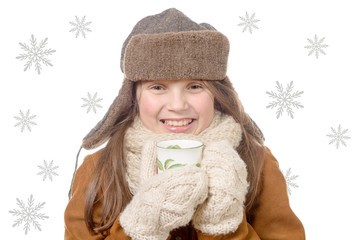 children fashion girl with fur winter coat and cup of tea