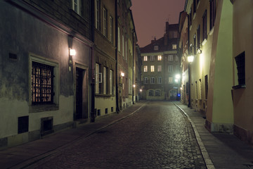 Fototapeta na wymiar Street of the old city in Warsaw at night