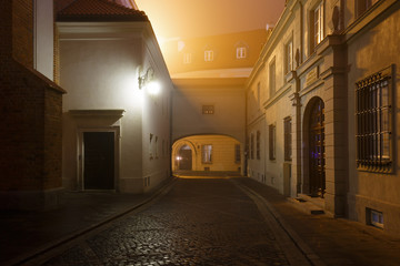 Street of the old city in Warsaw at night