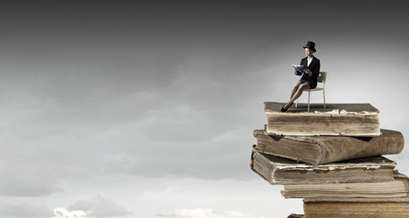 Girl in black cylinder