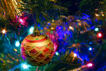 Christmas New Year's toys on a blurred background of Christmas t
