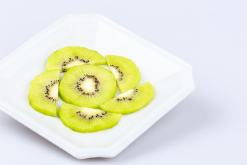 The beauty of the kiwi fruit slices on a plate