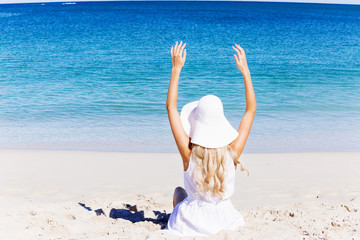 Young woman relaxing on the beach