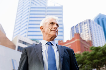 Portrait of confident businessman outdoors