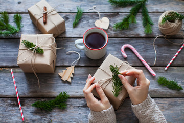girl decorates the christmas gifts in a scandinavian style © stock.film