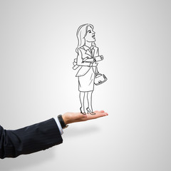Caricatures of businesswoman in palm