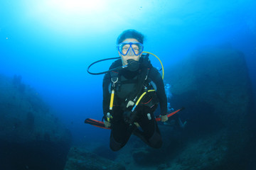 Young woman scuba diver