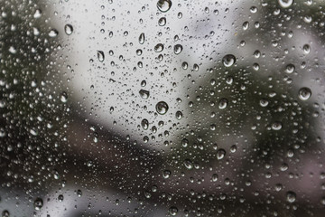 Drops of water perched on the glass.
