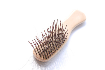 comb brush with lost hair 