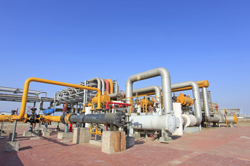 Oil field scene, oil pipelines and facilities
