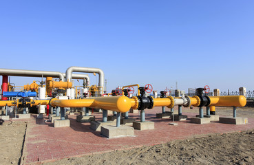 Oil field scene, oil pipelines and facilities