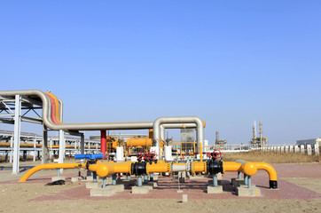 Oil field scene, oil pipelines and facilities