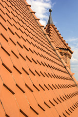 Naklejka premium Little brick tower and a new roof