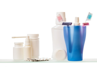 Shelves with medicine and toothbrushes