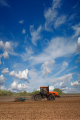 Fototapeta premium Tractor in the field