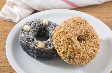 Dish of Fresh Chocolate Donut and Peanuts Donut