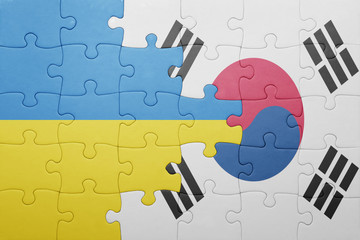 puzzle with the national flag of ukraine and south korea
