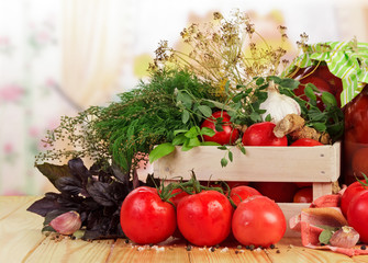 Tomatoes and herbs in crate