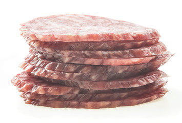 sliced salami isolated on white