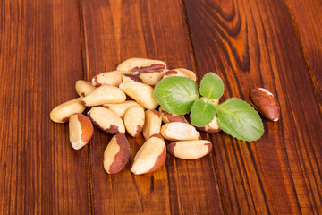 Brazil nuts on a wooden table.