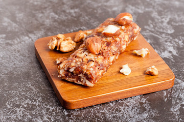 Granola bar on wooden background
