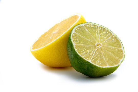 Sliced Limet and Lemon on White Desk