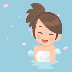 Pretty girls taking bath in onsen hot springs.