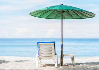 Beach chair and  umbrella   on the beach. Thailand.
