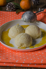 Ice cream with tangerine sauce	      