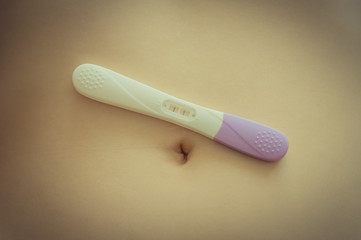 Positive pregnancy test on belly