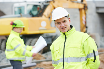 Engineer builders at construction site