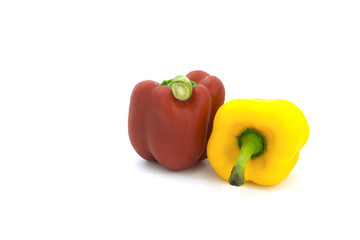Red and yellow sweet peppers isolated on white background 