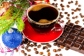Xmas still life cup of black coffee, beans, chocolate, christmas tree and balls