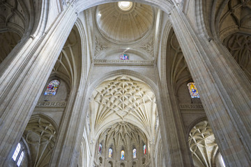 Faith interior Gothic Cathedral of Segovia, columns and arches w