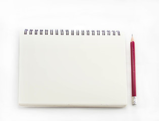 Blank notebook with pencil