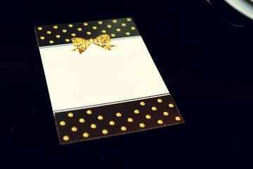 stylish luxury decorated blank invitation or a menu at the golde
